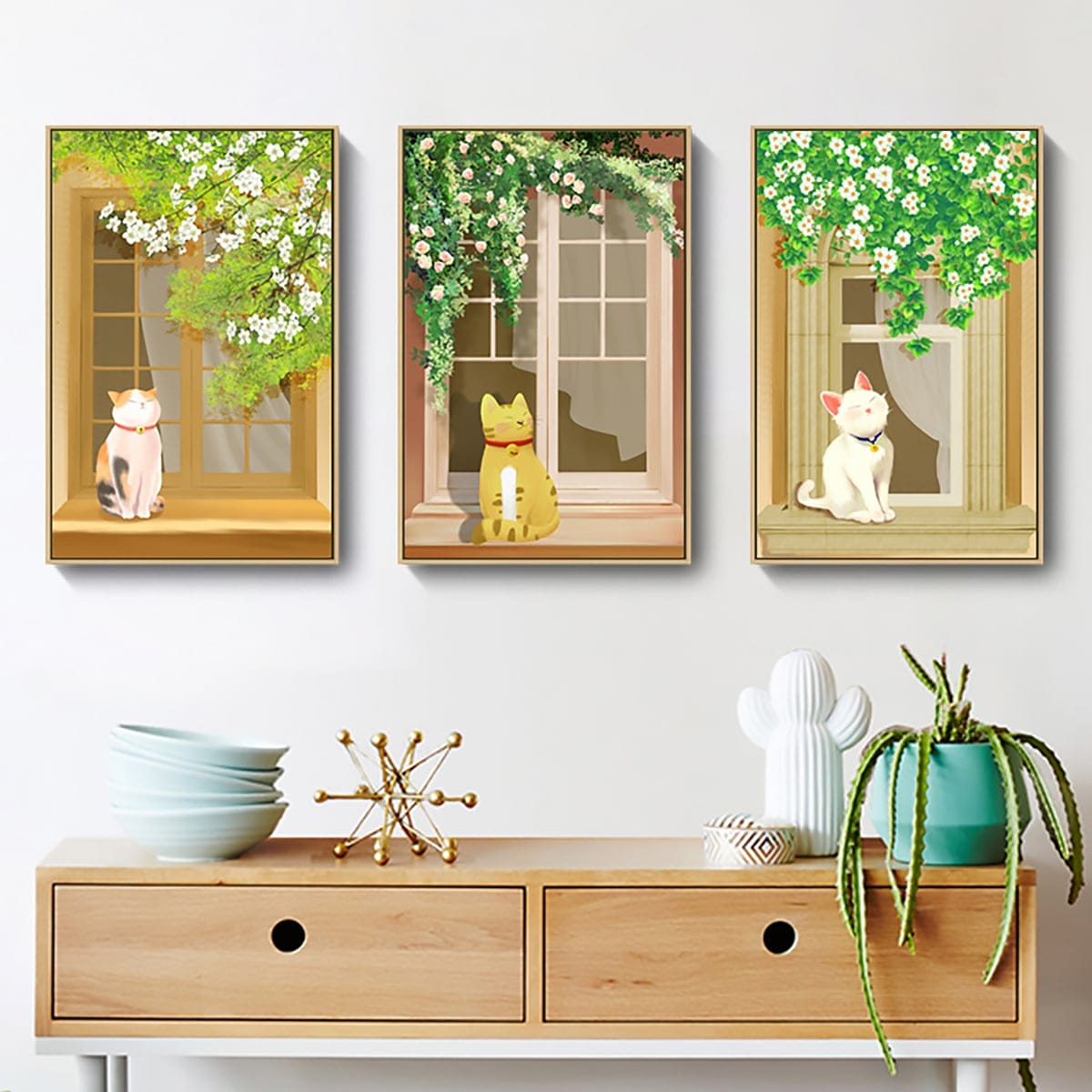 The Three Cats by the Window